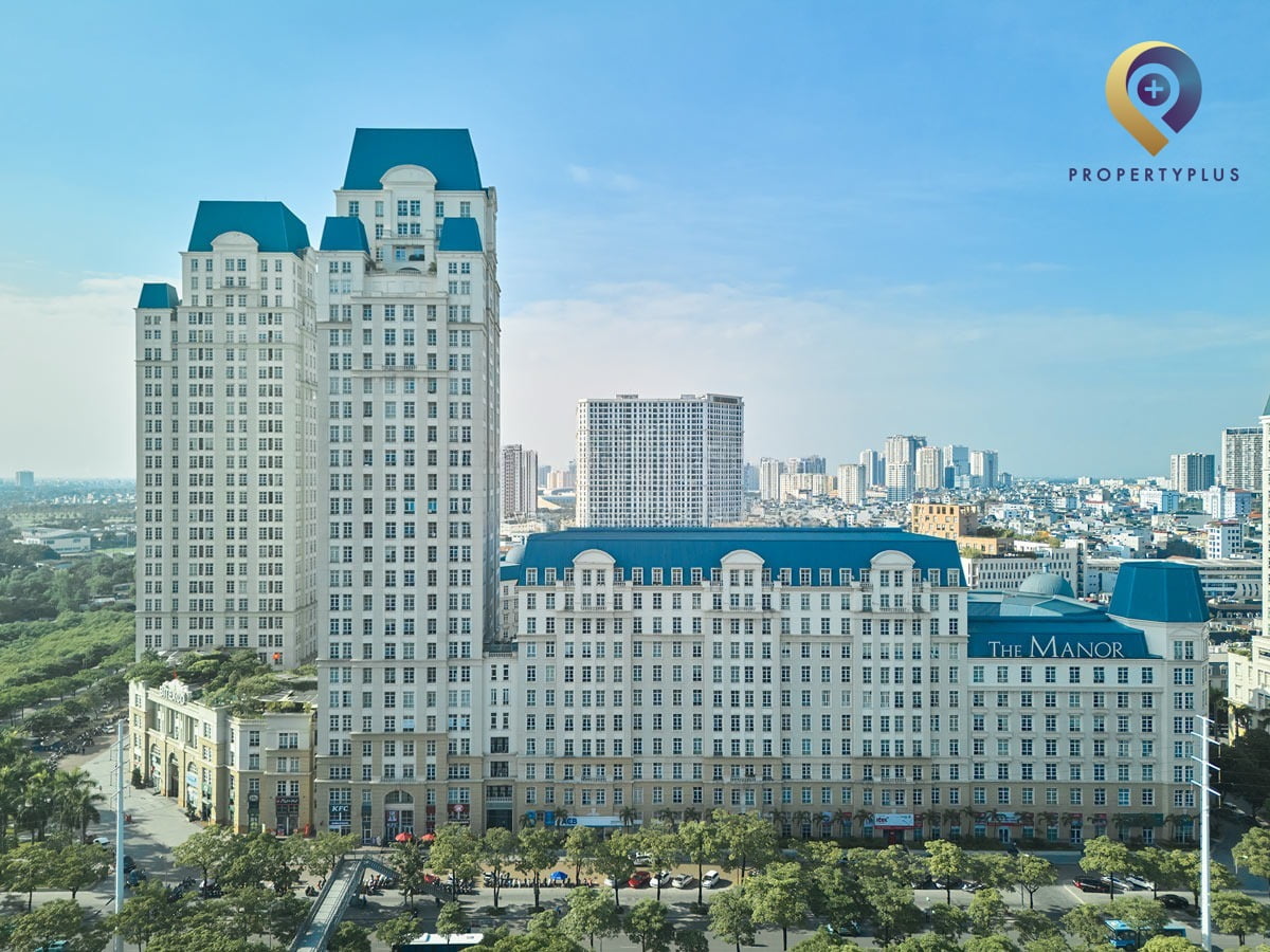 Toàn cảnh tòa nhà The Manor tại Nam Từ Liêm với kiến trúc hiện đại và mái xanh đặc trưng. - hình ảnh từ Property Plus